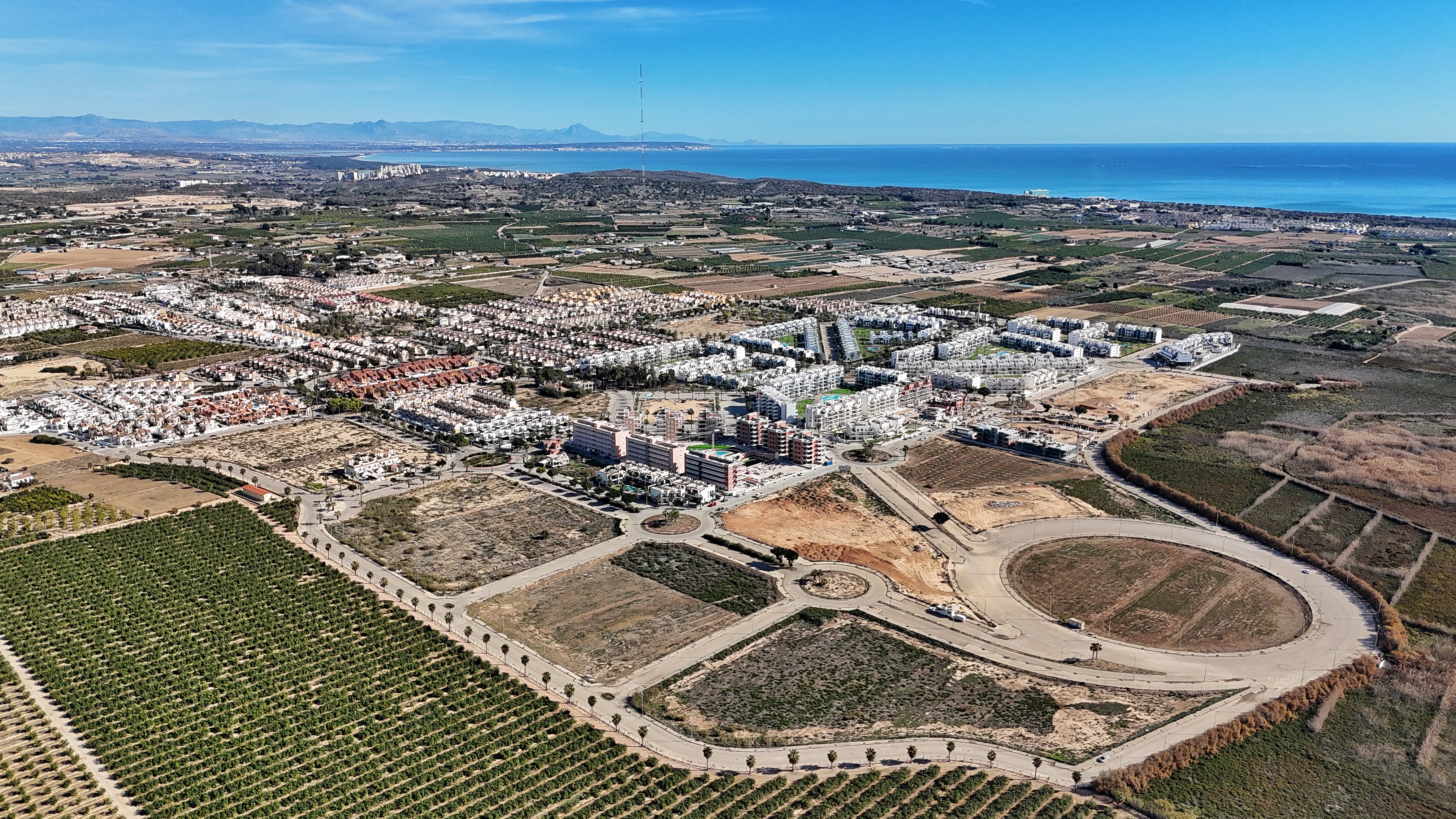Aerial view town & coastline